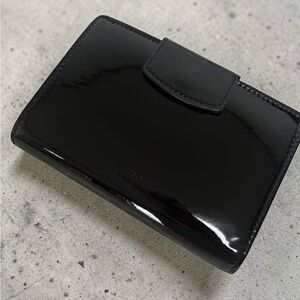 Celine Phoebe Philo Calfskin Multifunction Wallet in Black Patent leather.